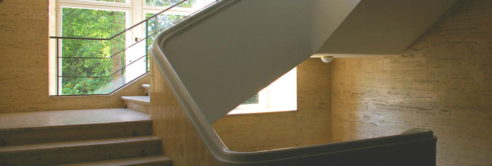 A light-flooded staircase at Freie Universität Berlin.