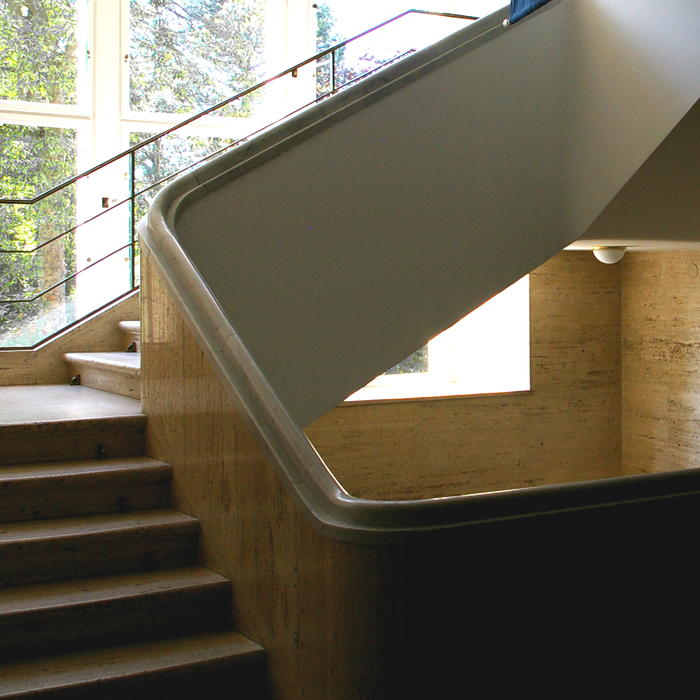 A light-flooded staircase at Freie Universität Berlin.
